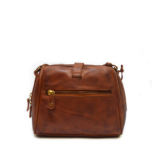 Back view of bag, handle down, brown leather, Sam Leather Crossbody Bag.